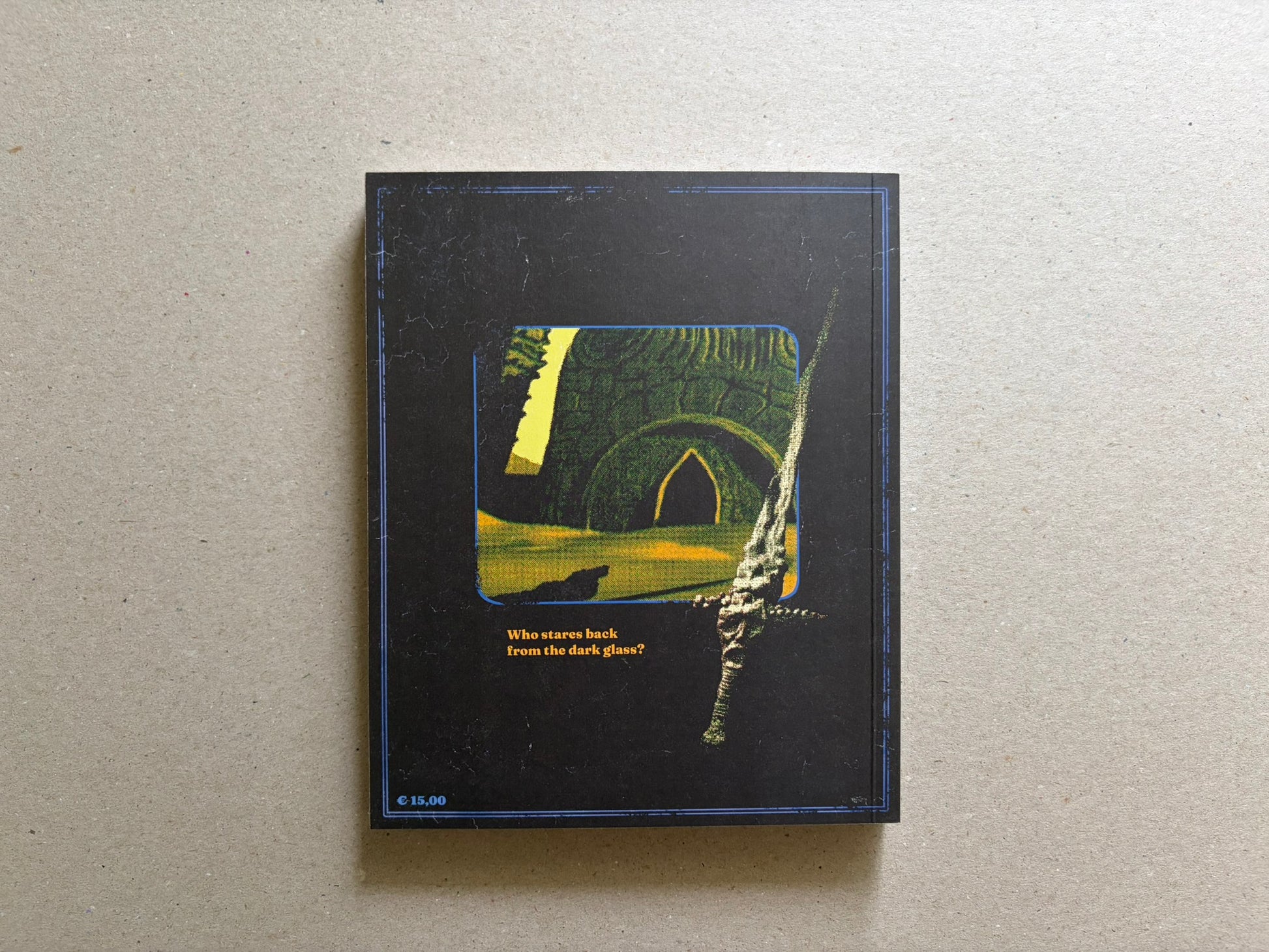 Back cover of the softcover edition, with a small framed image and the line Who stares back from the dark glass?