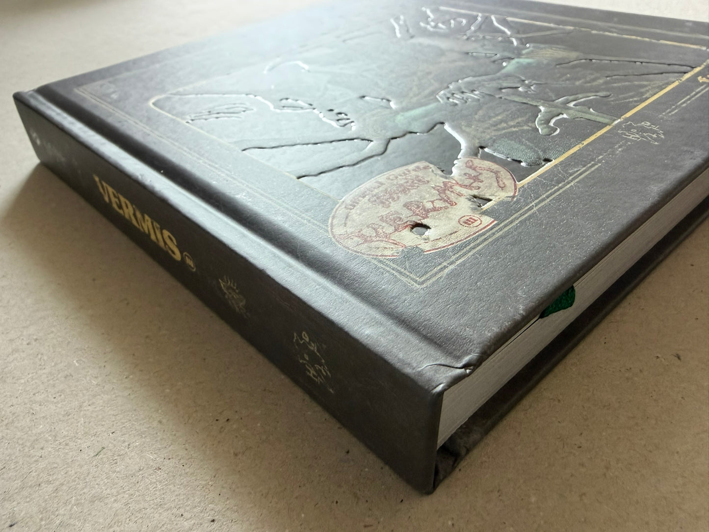 Vermis III Forsaken Edition hardcover shown at an angle, highlighting the embossed cover and spine.