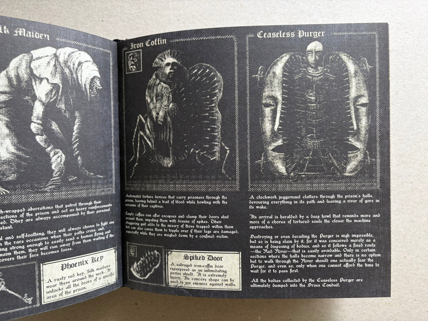 Open Vermis III Forsaken Edition spread with monster entries, including Iron Coffin and Ceaseless Purger.
