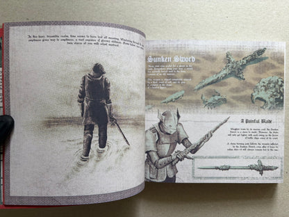 Open Vermis III spread with a pale figure on the left page and a sword illustration on the right page.