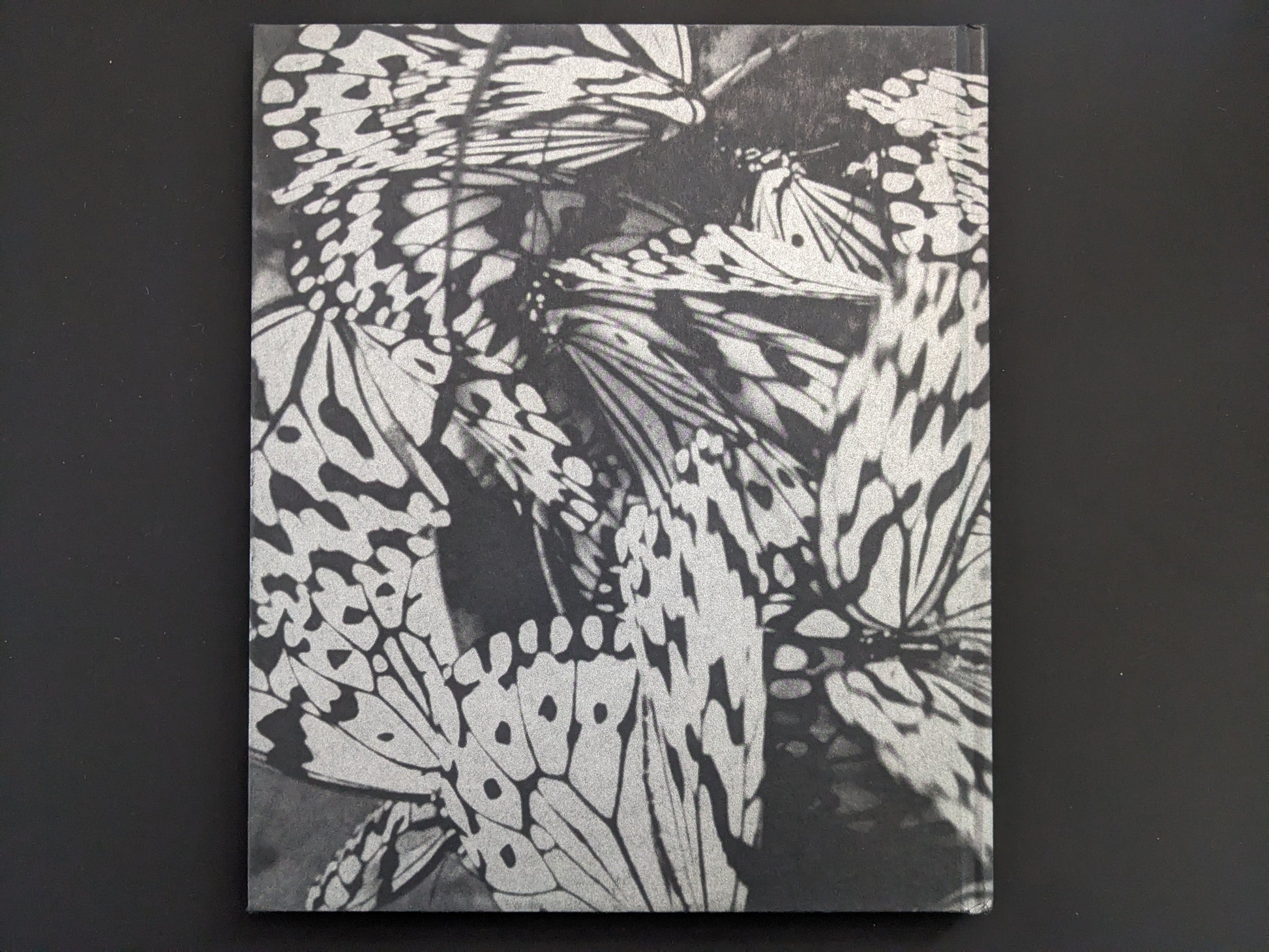 Back cover of Wandering Dog by Mai Nakama with butterfly motif
