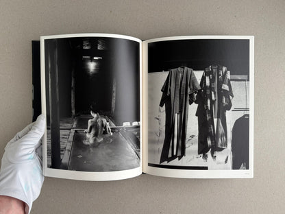 Wandering Dog by Mai Nakama, open photobook spread with two black-and-white photographs