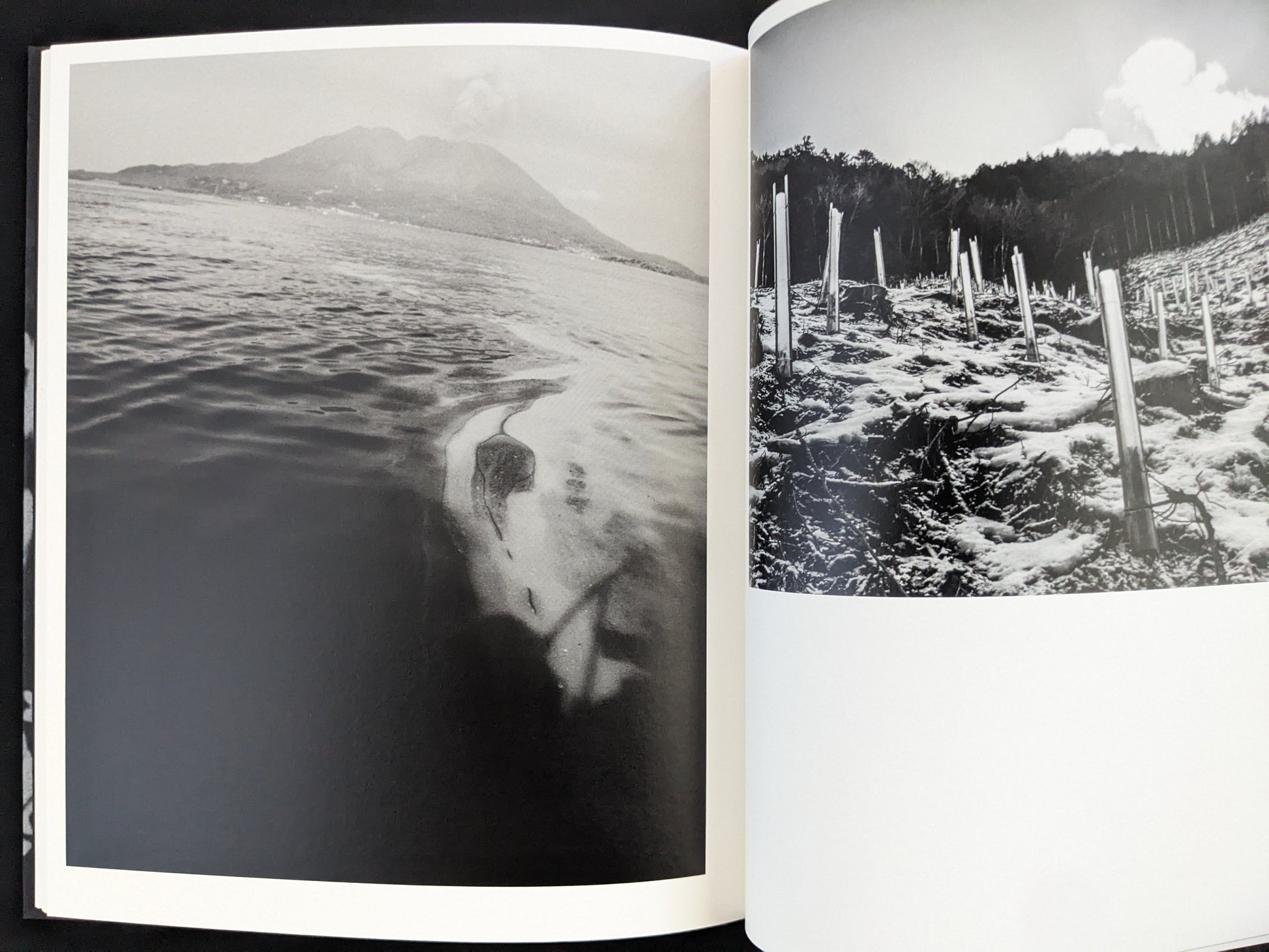 Rural seascape with water reflections in black and white