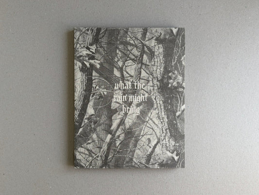 Front cover of What the Rain Might Bring by Dylan Hausthor, showing a black-and-white forest image with the title printed in the center.