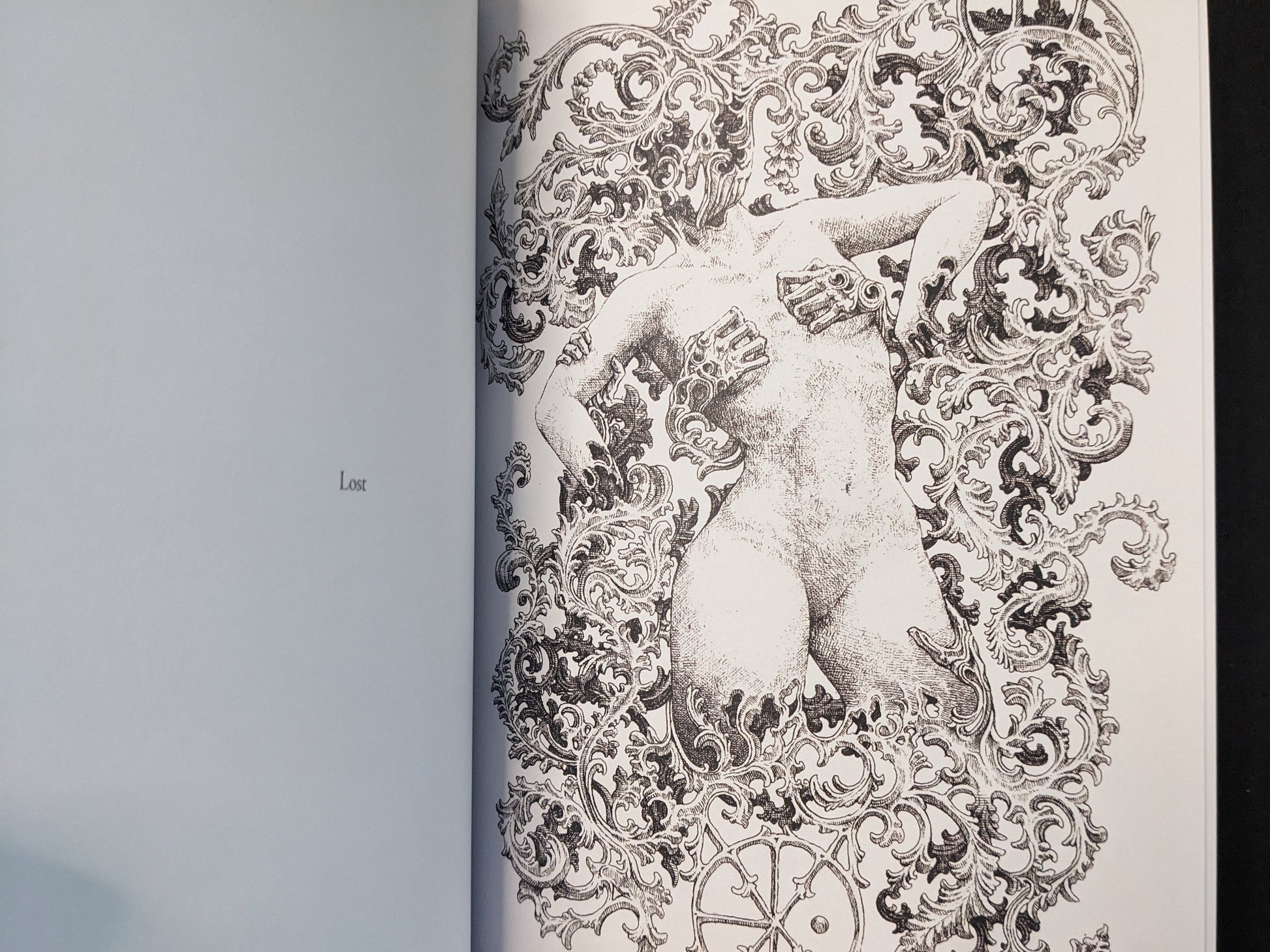 “Lost” spread from Where Shadows Breathe: The Art of Melf, black-and-white figure framed by baroque ornamental patterns.