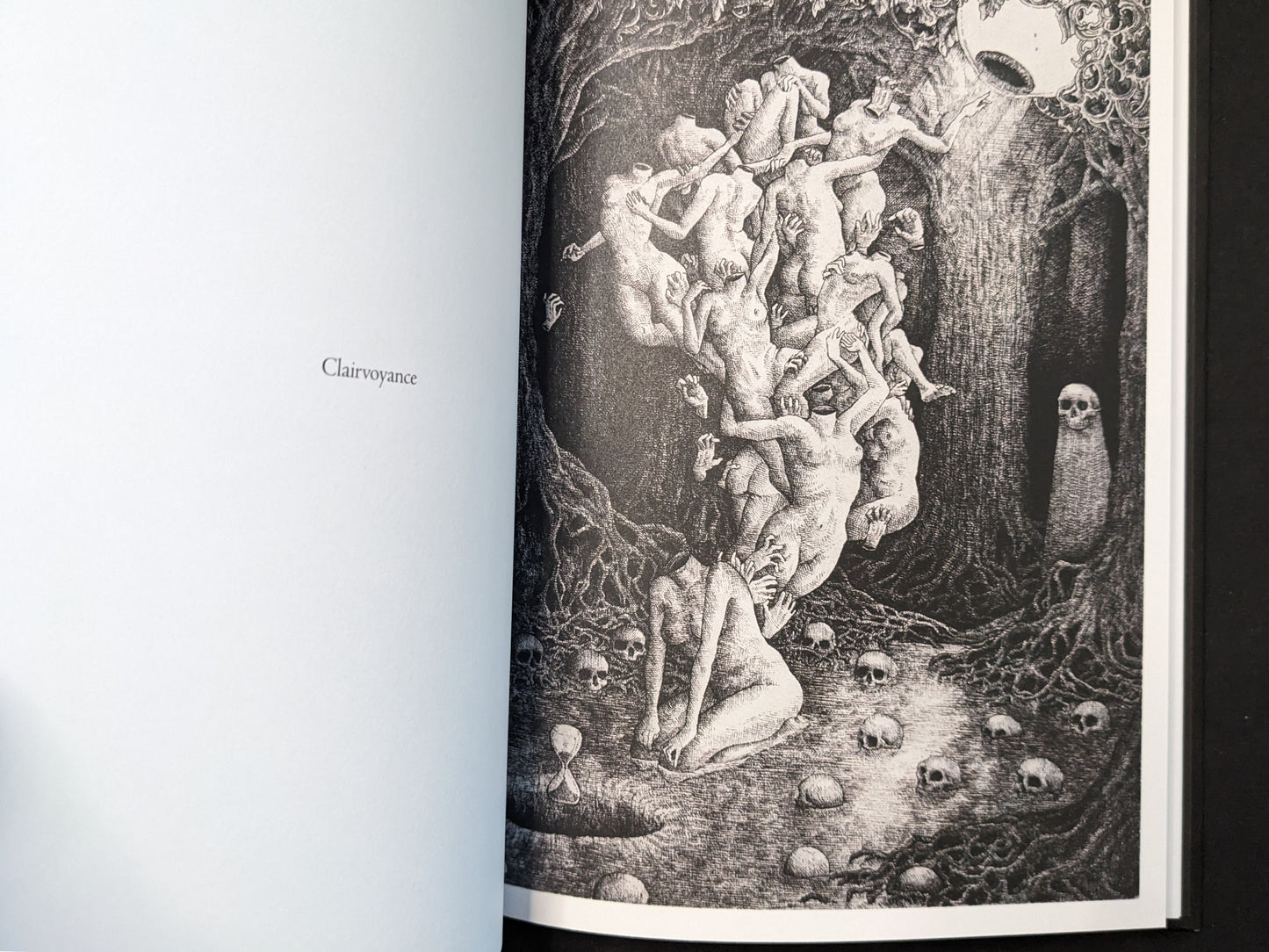 “Clairvoyance” spread from Where Shadows Breathe: The Art of Melf by Melf, black-and-white scene with multiple figures and scattered skulls.