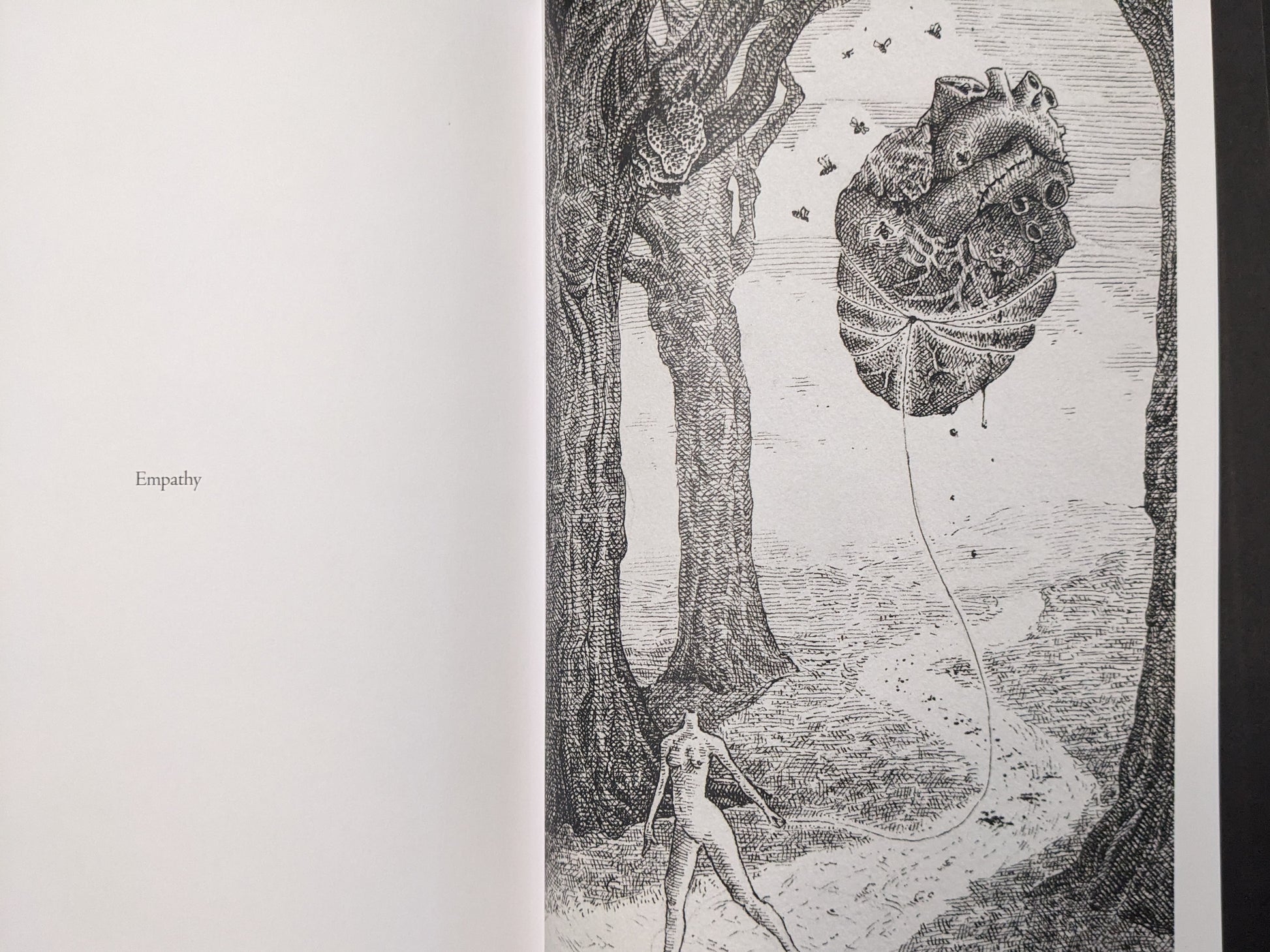 “Empathy” spread from Where Shadows Breathe: The Art of Melf, black-and-white drawing with a floating anatomical heart tied like a balloon near a solitary figure.