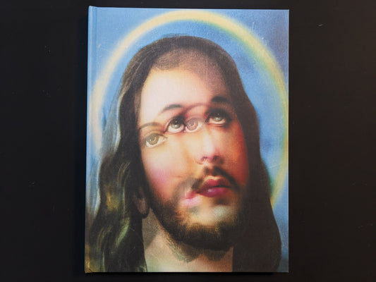Cover of “¥€$U$ (JESUS)” showing a multi-layered portrait of Jesus with doubled eyes and a soft halo.