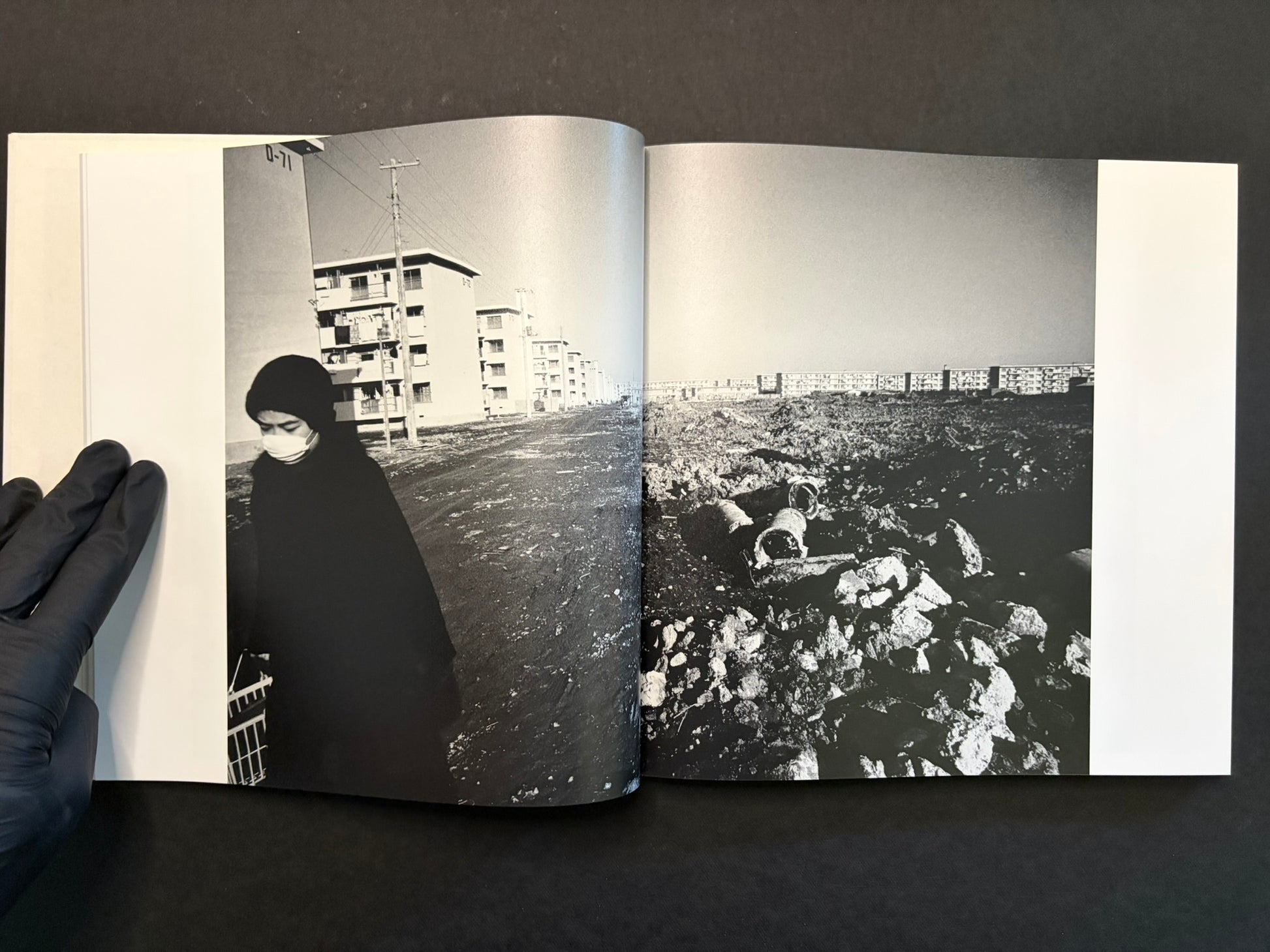 Open spread with a blurred figure at night on the left and a bag on rough ground on the right.