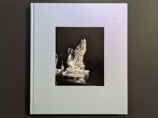 Front cover of i shall sing these songs beautifully by Yorgos Lanthimos, MACK Books, 2024. Embossed hardcover with black-and-white tipped-in photograph.