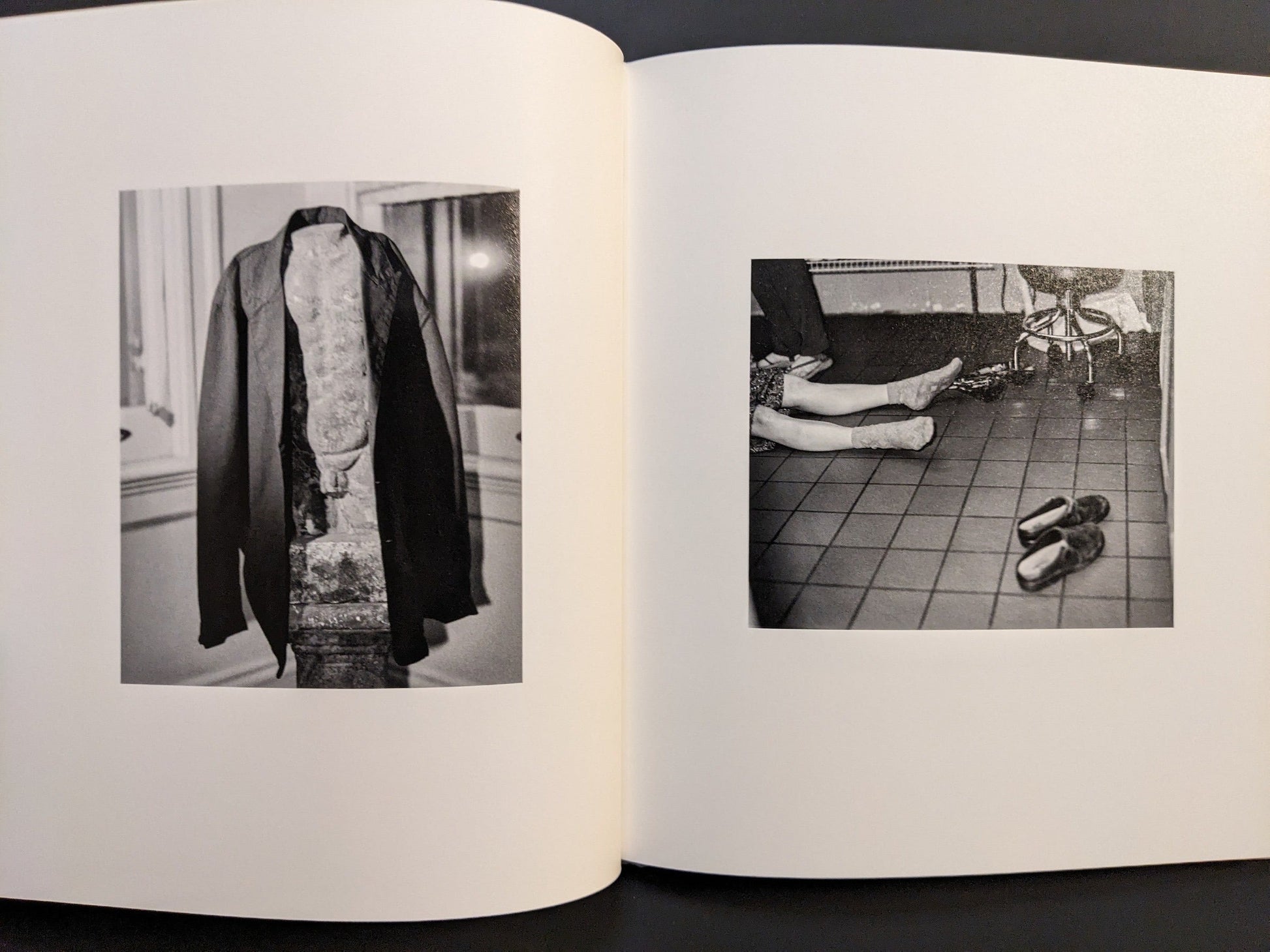 Black-and-white photographs showing a tiled interior scene and a veiled statue from i shall sing these songs beautifully.