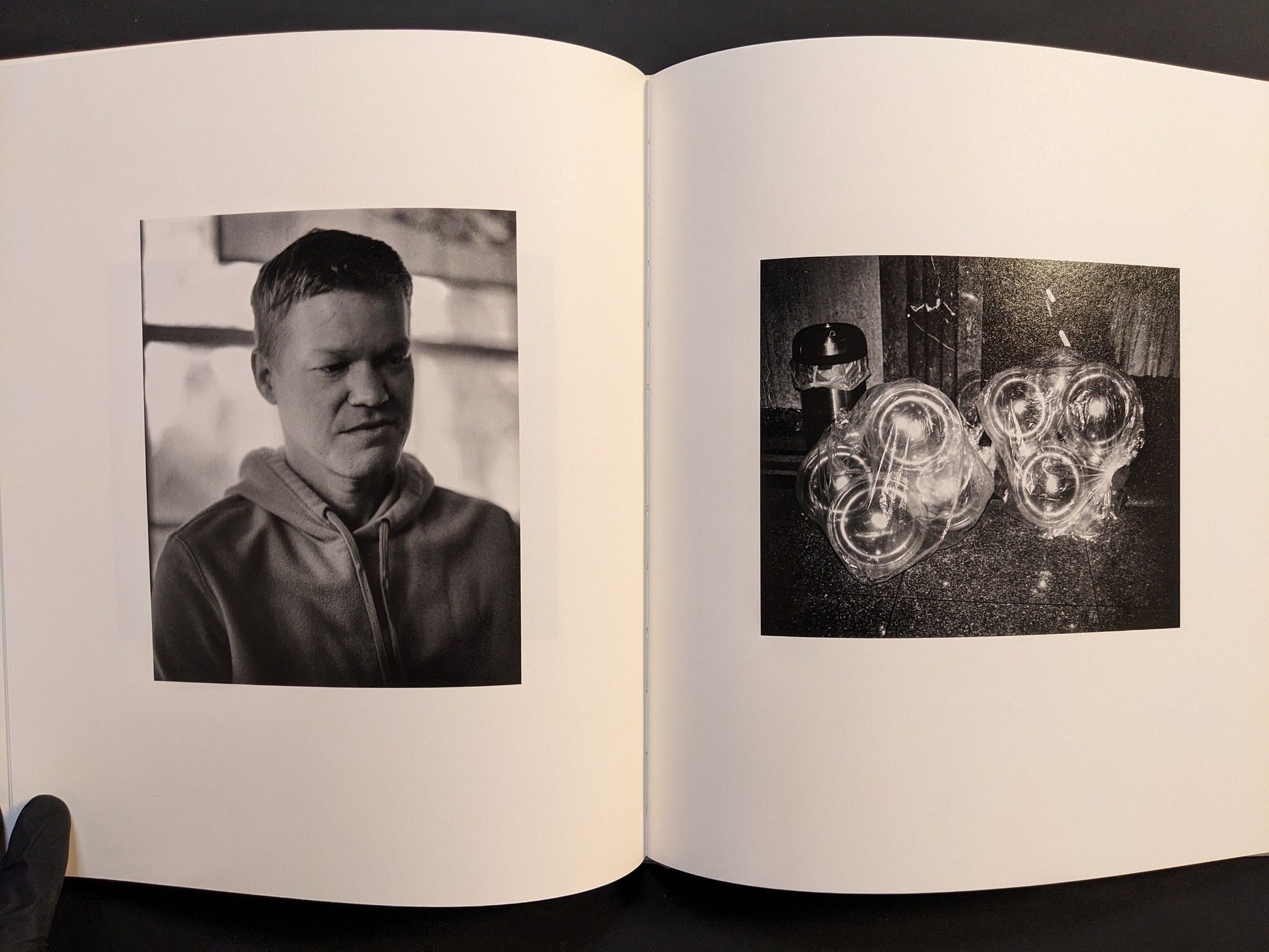 Final spread from i shall sing these songs beautifully featuring portraits and reflective black-and-white compositions.