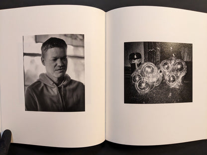 Final spread from i shall sing these songs beautifully featuring portraits and reflective black-and-white compositions.